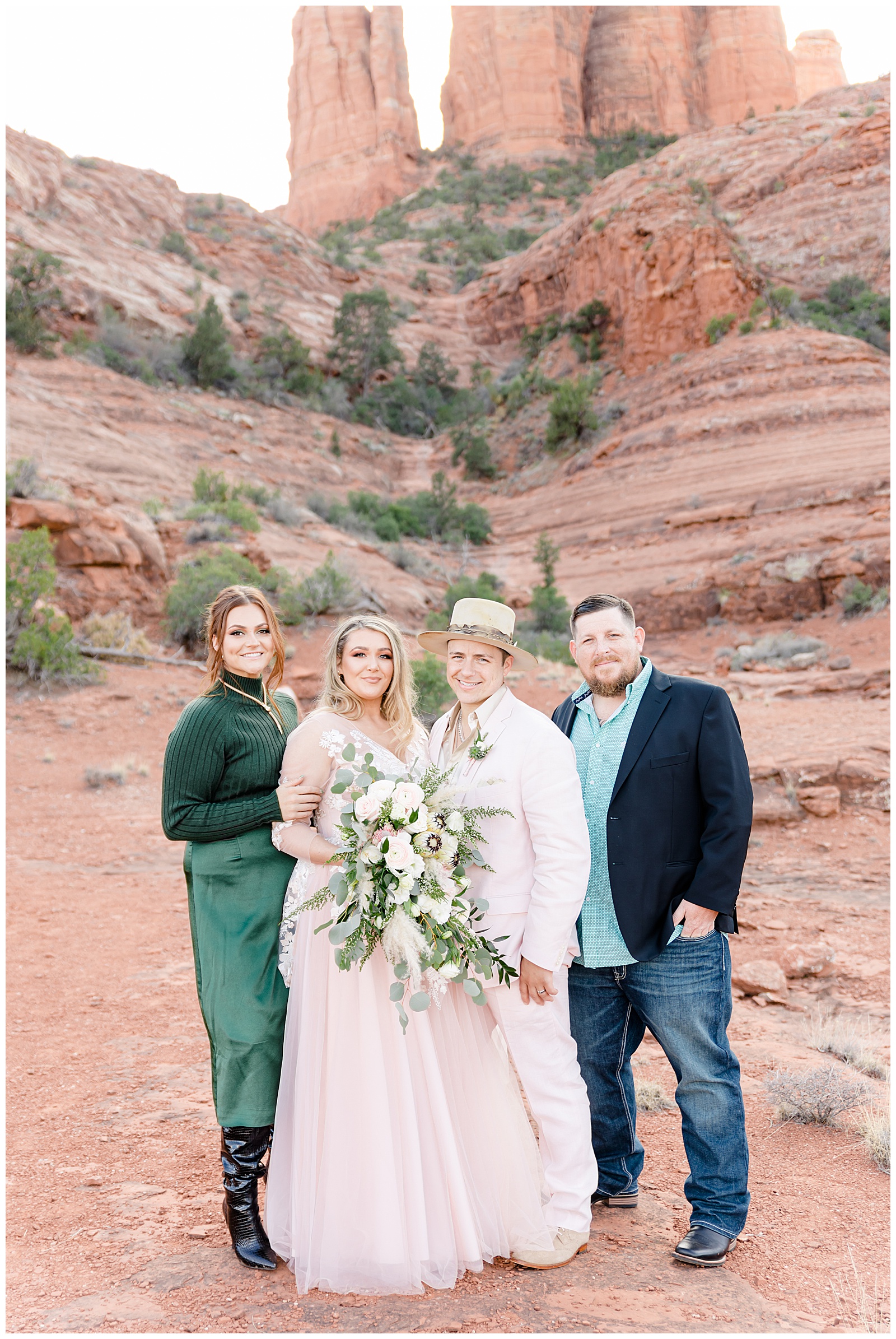 An elopement couple and their two witnesses in front of Cathedral rock