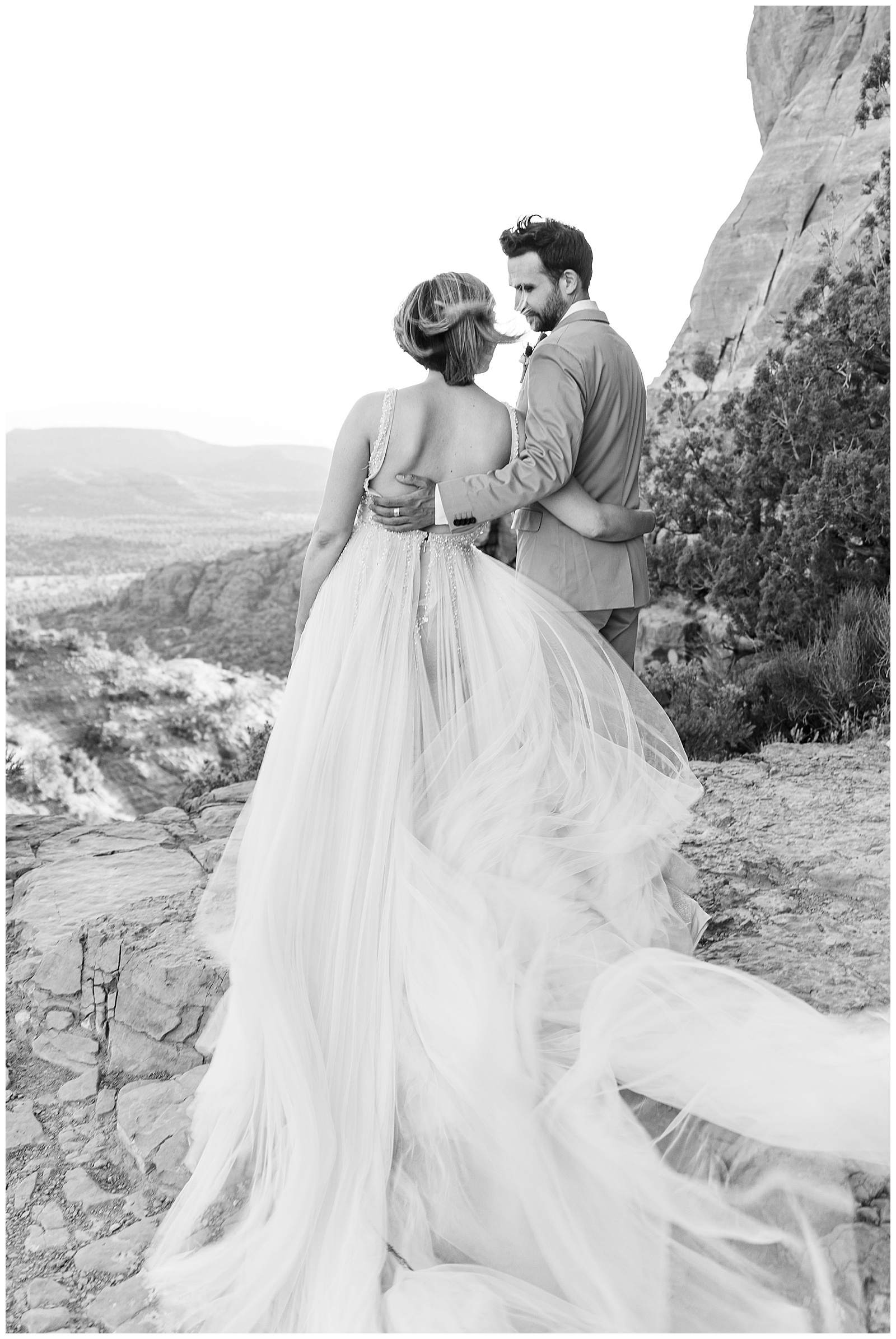 engagement photography sedona cathedral rock bhldn gown flowing in wind