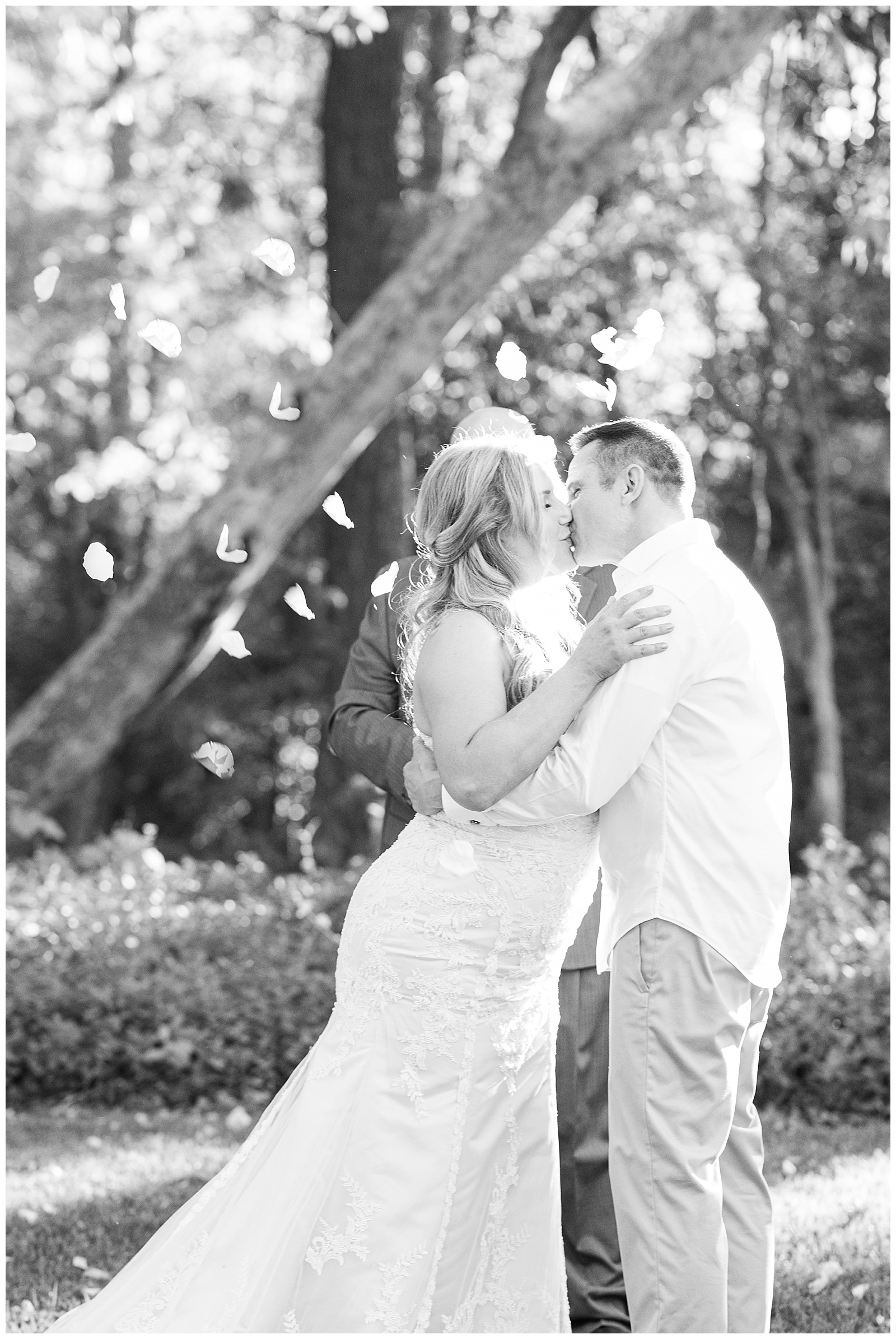 Bride and groom kiss for the first time at their intimate wedding